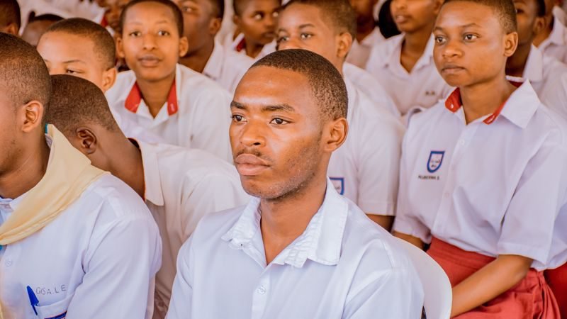 High school learners in uniform in a classroom